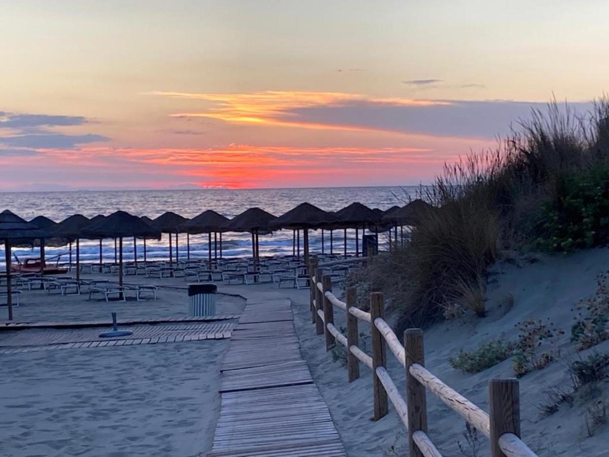 Toscana Charme Resort Tirrenia Esterno foto Sunset at Sabinillas