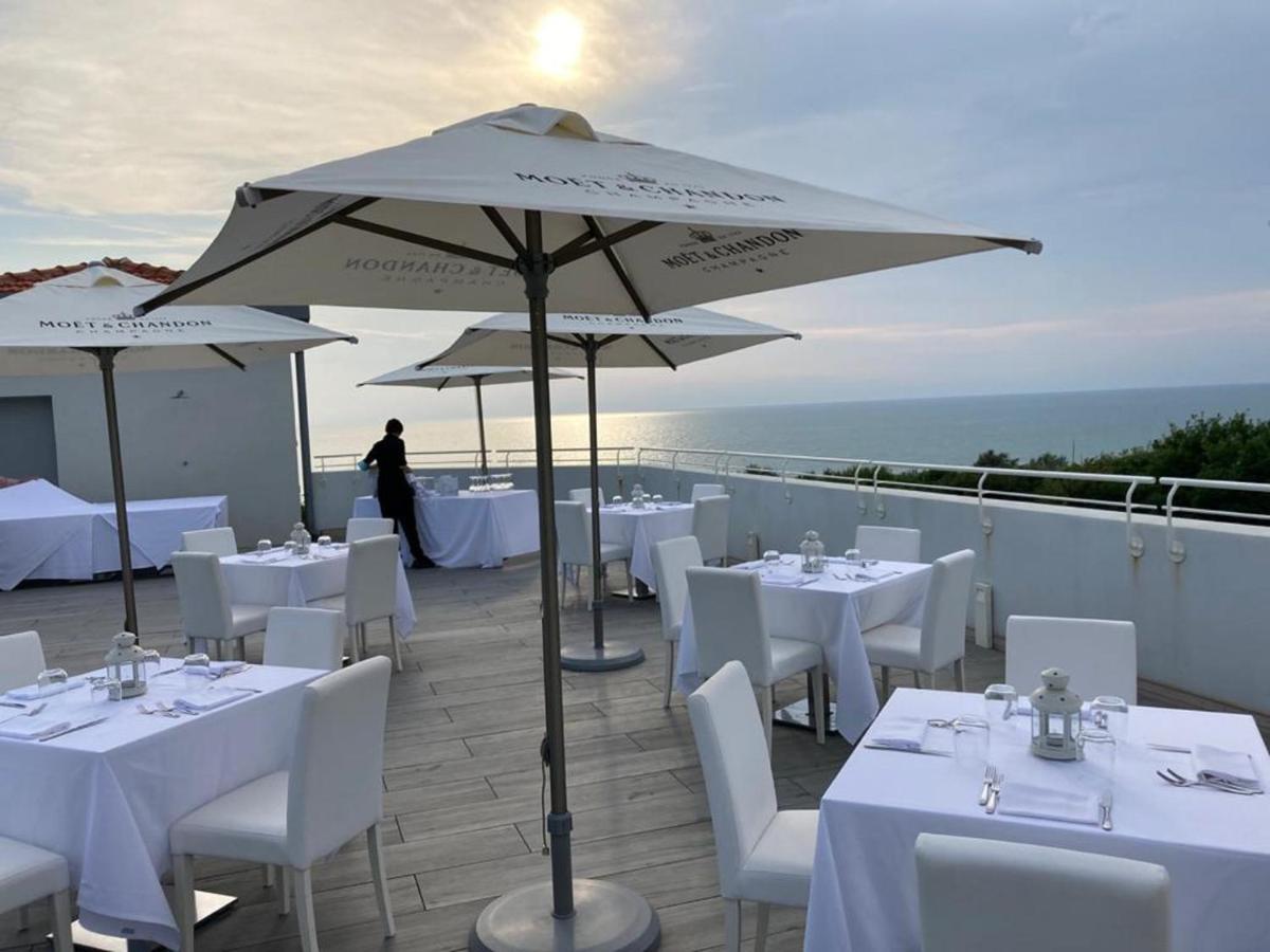 Toscana Charme Resort Tirrenia Esterno foto The rooftop restaurant