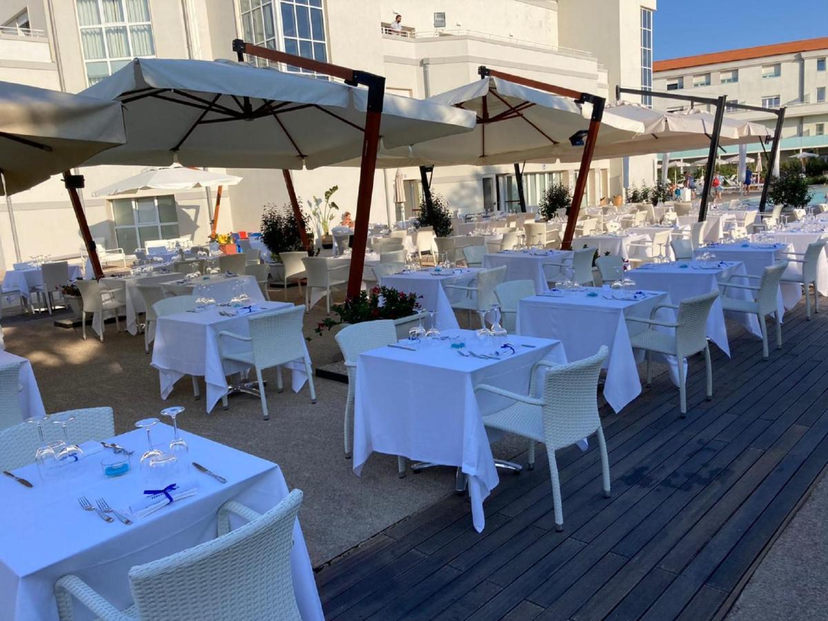 Toscana Charme Resort Tirrenia Esterno foto Restaurant in Port of Skala