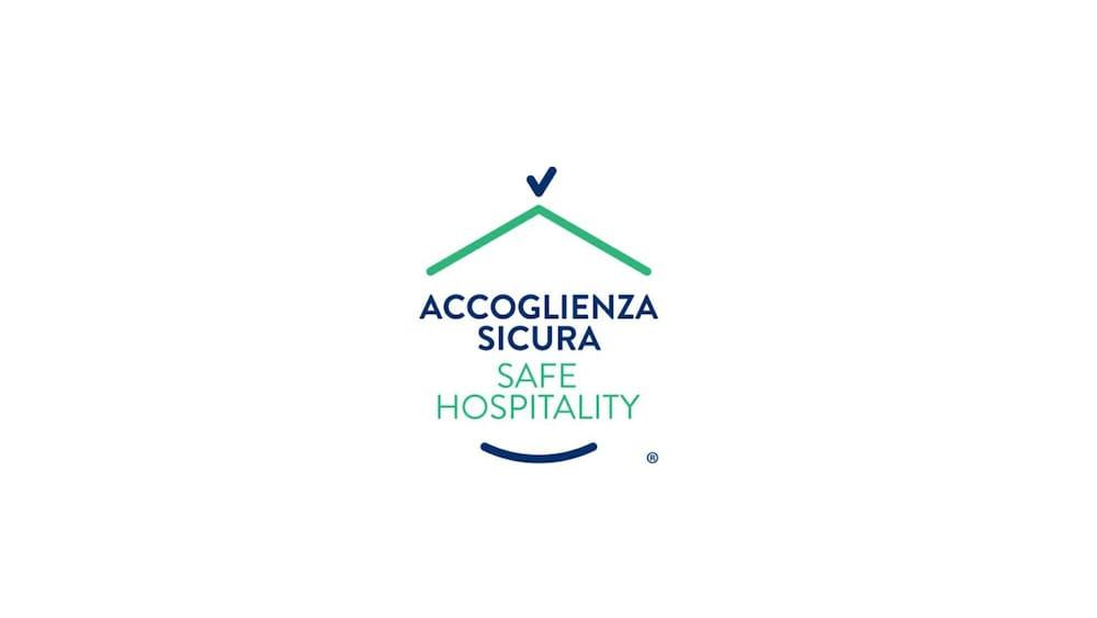 Toscana Charme Resort Tirrenia Esterno foto Safe Hospitality logo