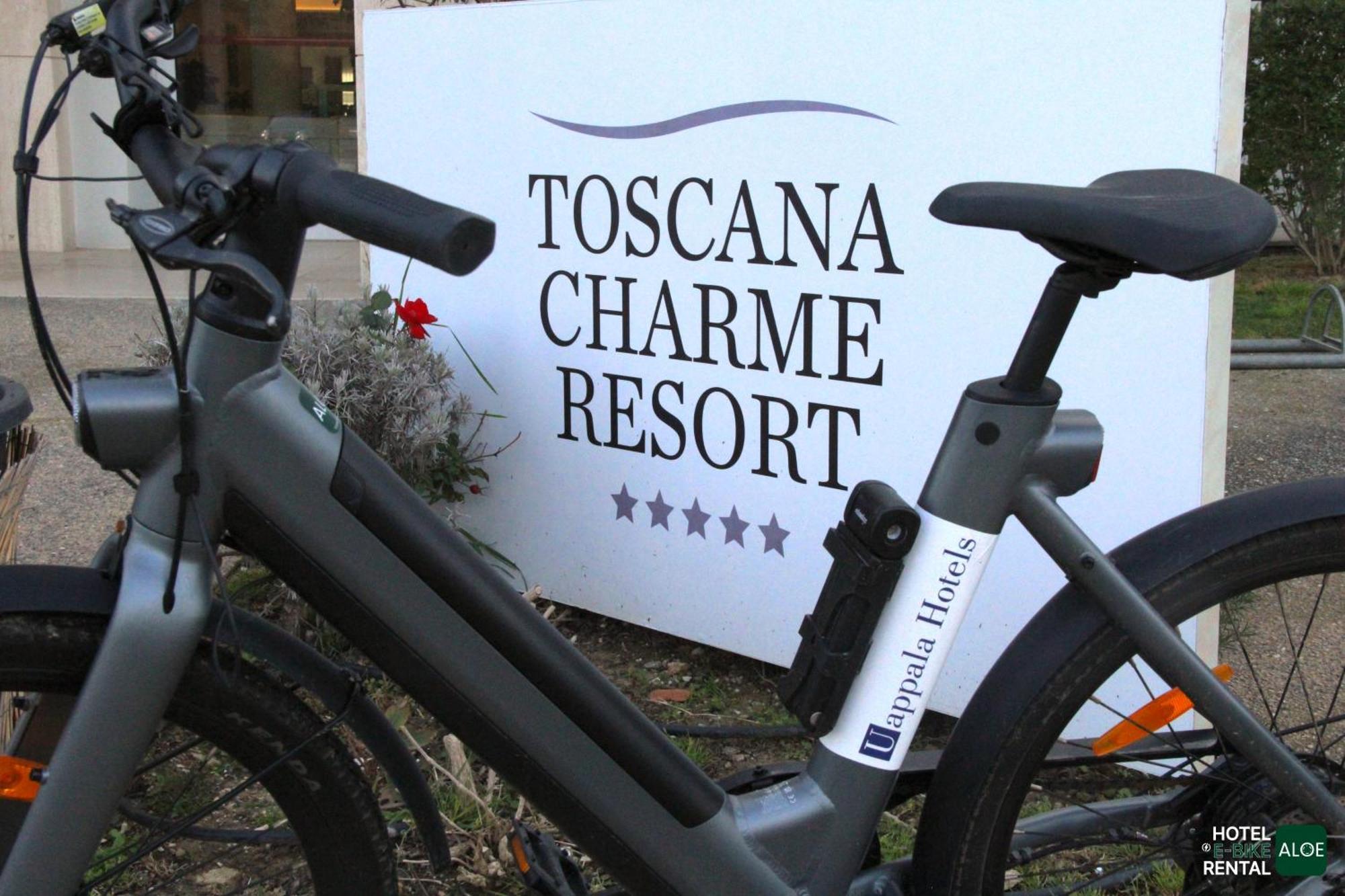 Toscana Charme Resort Tirrenia Esterno foto Bicycle rental at the hotel