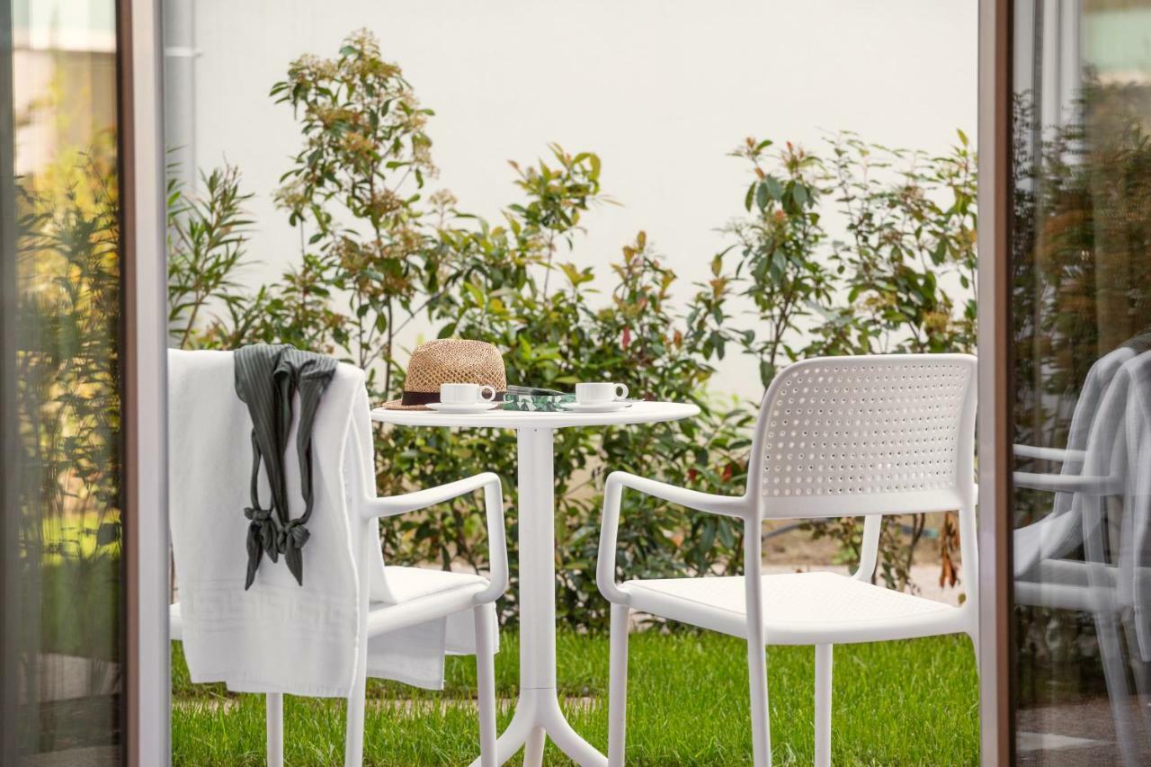 Toscana Charme Resort Tirrenia Esterno foto Trill Armchair