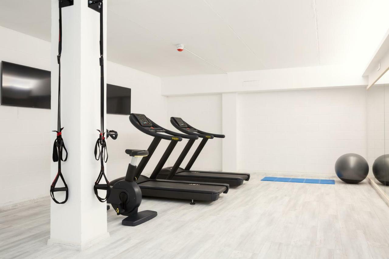 Toscana Charme Resort Tirrenia Esterno foto A Peloton bike in a gym